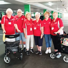 Stockland walking group wearing red heart foundation polos